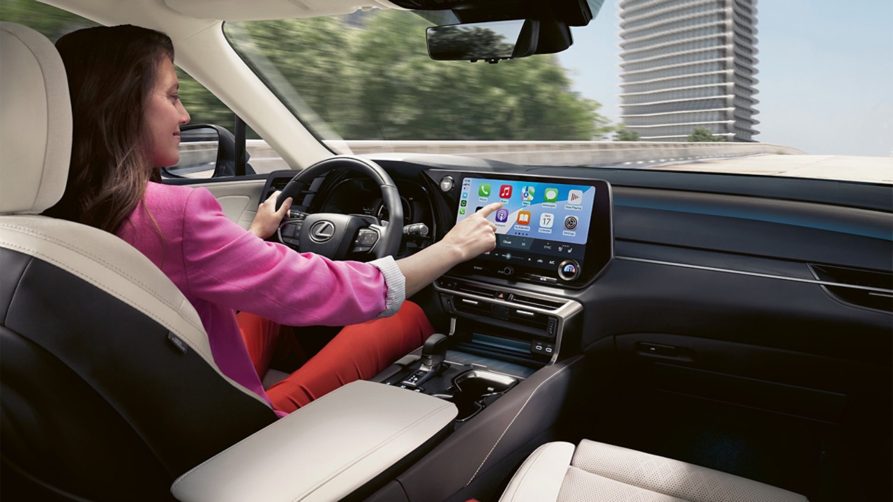 A driver sat in a Lexus RX