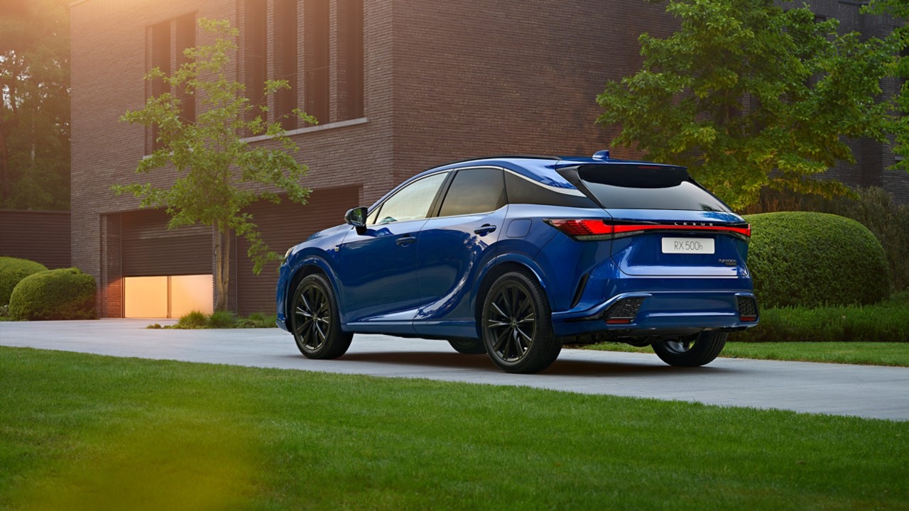 A Lexus RX driving on a coastal road