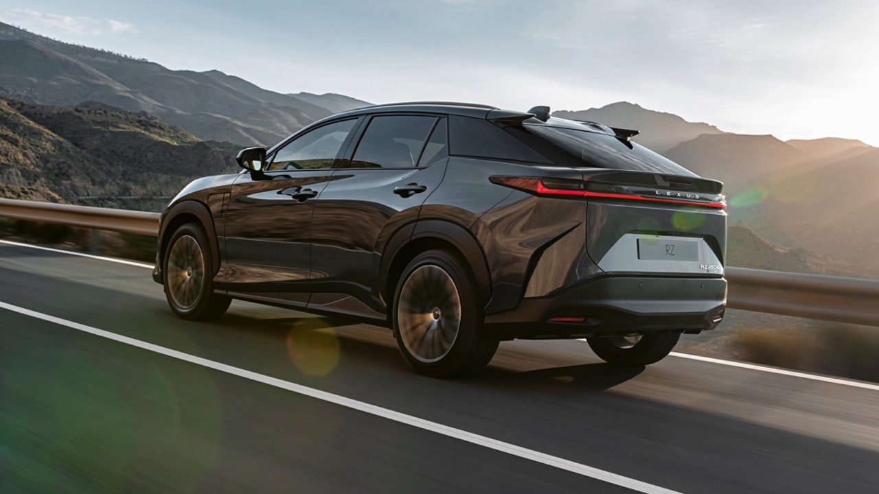 Lexus RZ driving in a mountainous location