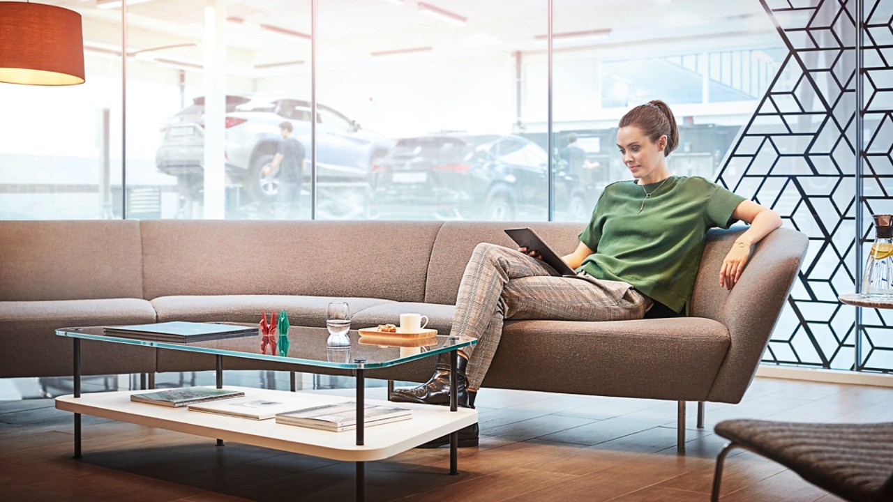 A woman sitting on a sofa